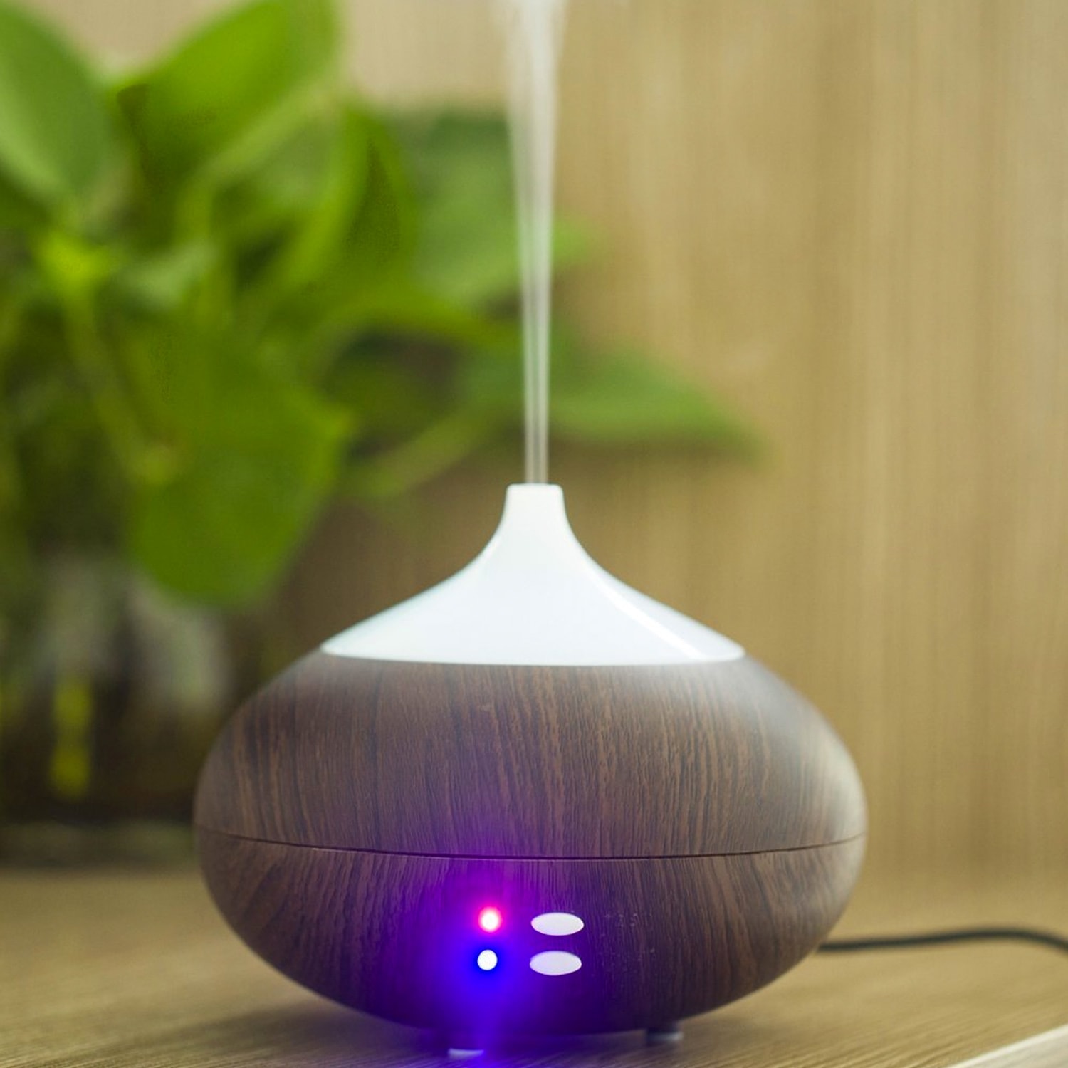 Wooden style vase aroma diffuser on wooden table